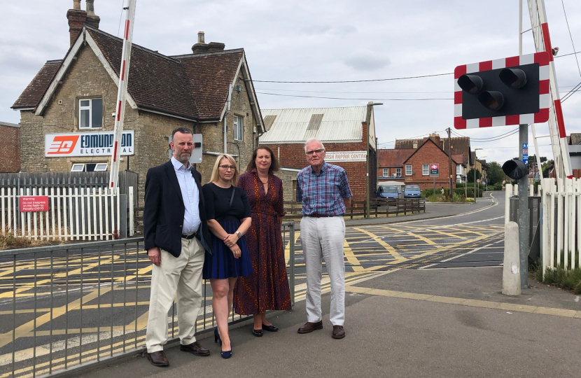Councillors Dan Sames, Donna Ford and Michael Waine with Victoria Prentis MP at the London Road crossing